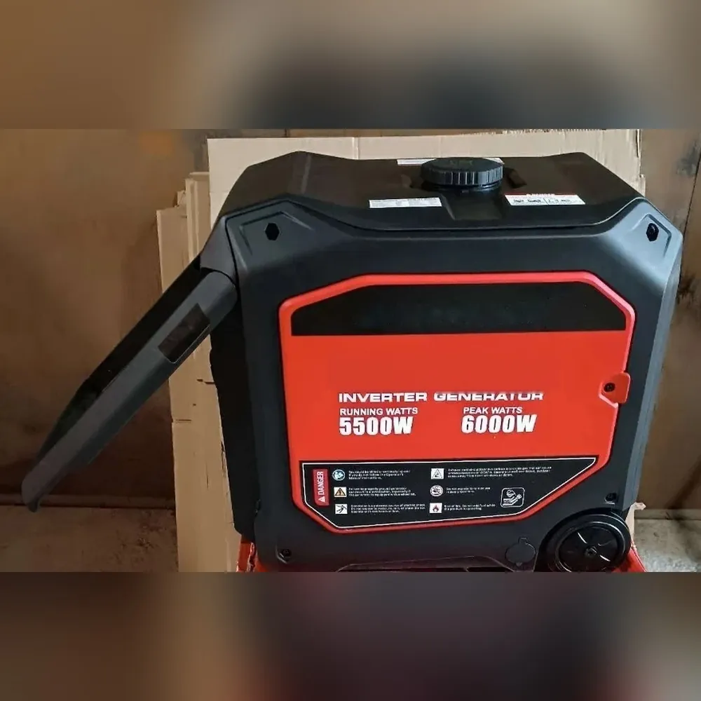 Генератор збоку: червона плашка з написами RUNNING WATTS 5500W і PEAK WATTS 6000W, висунута ручка, колесо